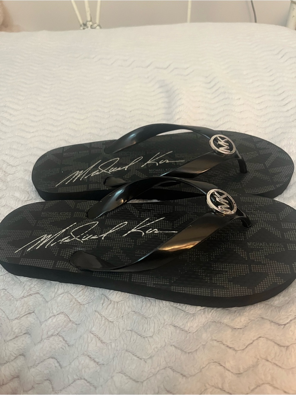 Michael Kors Black Logo Thong Sandals with Silver Emblem